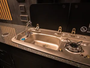 Large motorhome conversion by Custom Built Campervans Sheffield - professional van conversion showing interior and exterior craftsmanship