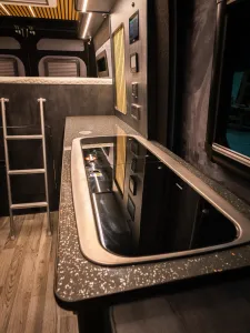 Large motorhome conversion by Custom Built Campervans Sheffield - professional van conversion showing interior and exterior craftsmanship