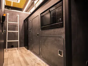 Large motorhome conversion by Custom Built Campervans Sheffield - professional van conversion showing interior and exterior craftsmanship