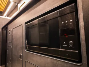 Large motorhome conversion by Custom Built Campervans Sheffield - professional van conversion showing interior and exterior craftsmanship