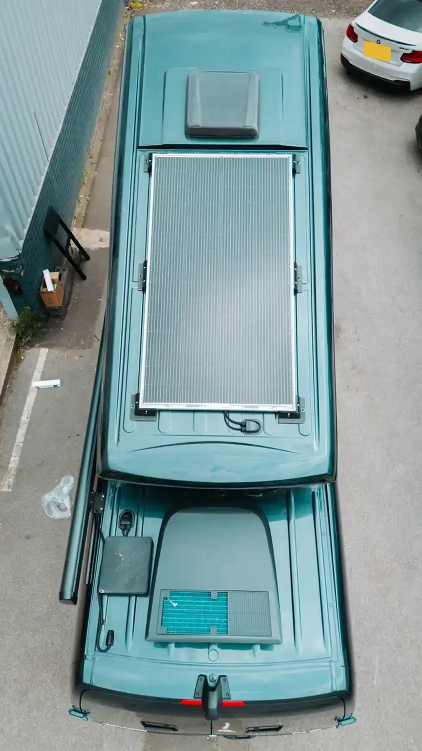 Solar and pop-top from above, bespoke 4x4 Mercedes Sprinter campervan