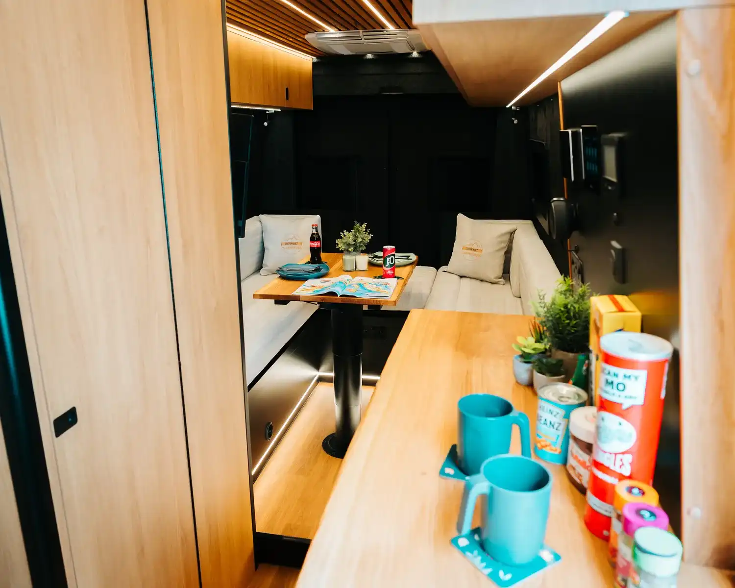 Looking back through the lounge, bespoke 4x4 Mercedes Sprinter campervan