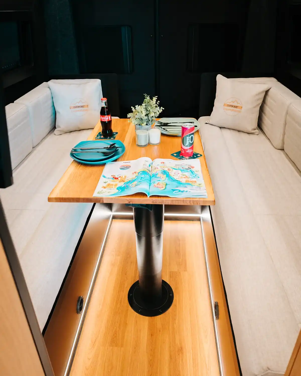 Lounge set for dinner, bespoke 4x4 Mercedes Sprinter campervan