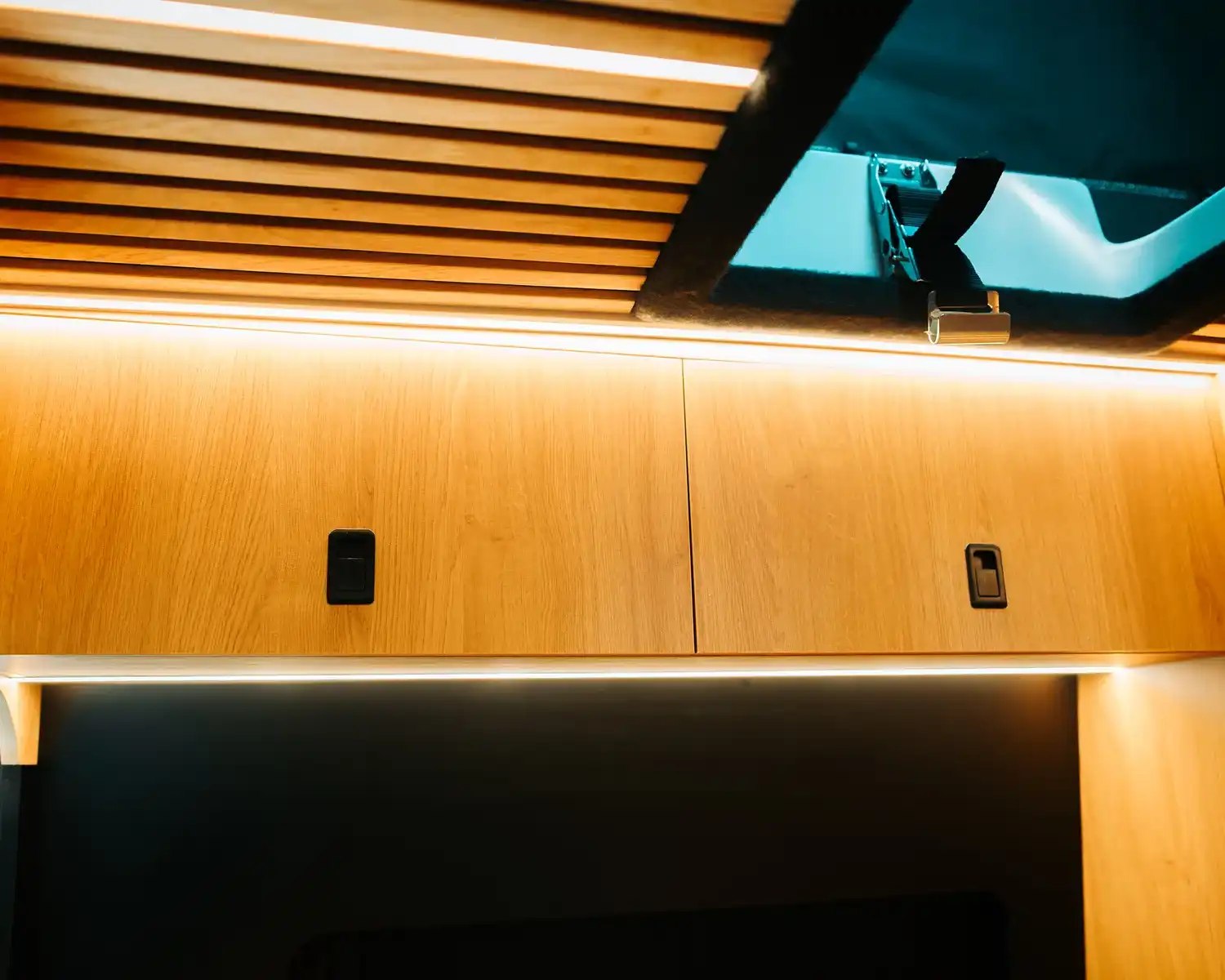 Overhead lockers with lighting, bespoke 4x4 Mercedes Sprinter campervan