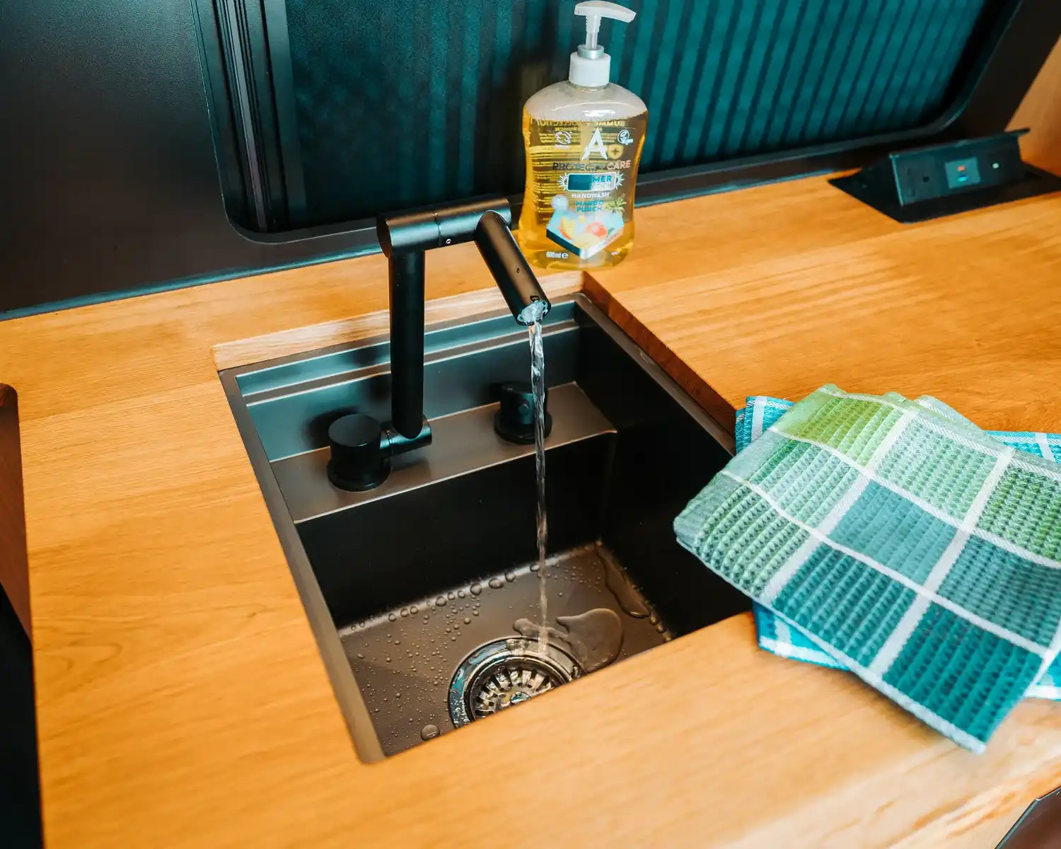 Sink and tap, bespoke 4x4 Mercedes Sprinter campervan