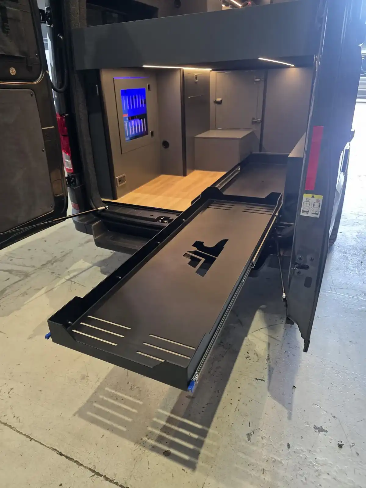MAN TGE Luxus Pop-top campervan conversion by Custom Built Campervans Sheffield - professional van conversion showing interior and exterior craftsmanship