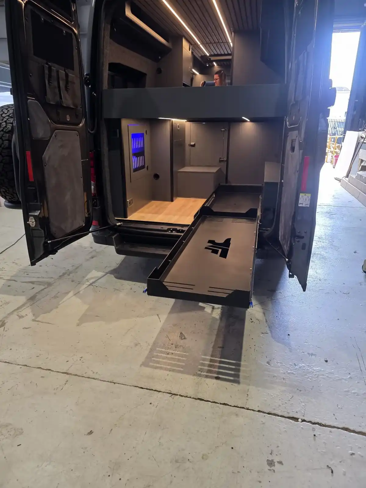 MAN TGE Luxus Pop-top campervan conversion by Custom Built Campervans Sheffield - professional van conversion showing interior and exterior craftsmanship