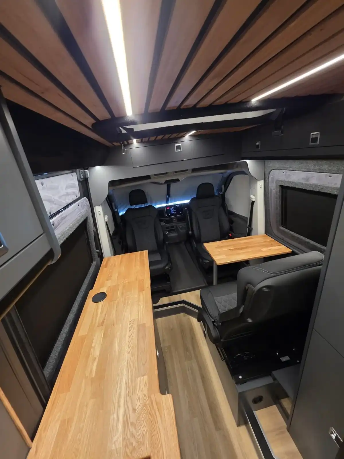 MAN TGE Luxus Pop-top campervan conversion by Custom Built Campervans Sheffield - professional van conversion showing interior and exterior craftsmanship