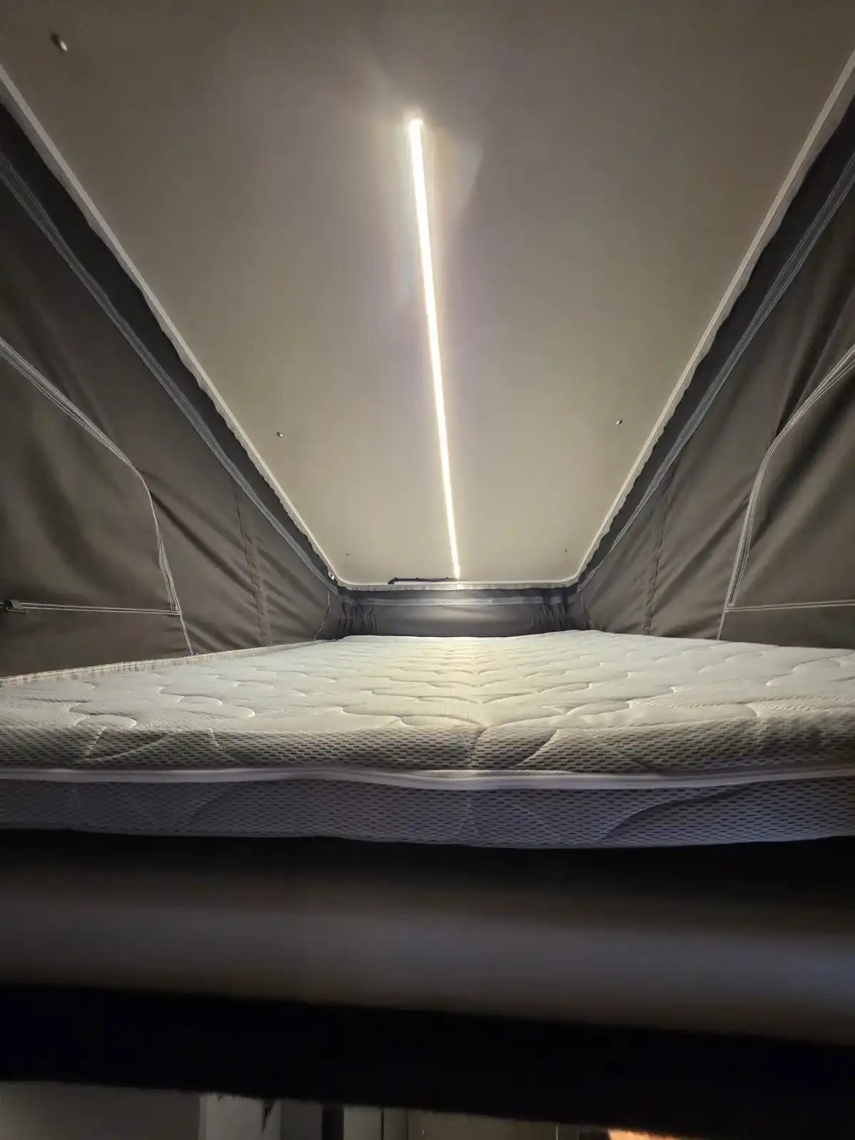 MAN TGE Luxus Pop-top campervan conversion by Custom Built Campervans Sheffield - professional van conversion showing interior and exterior craftsmanship