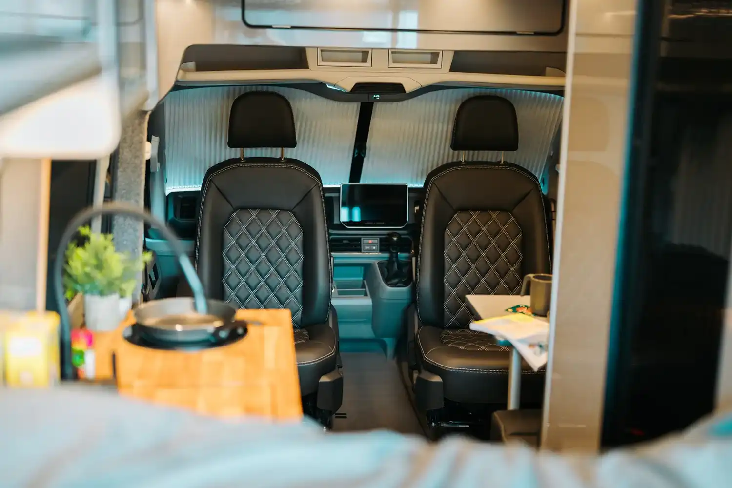 Looking forward to the quilted swivel cab seats of a Ventus VW Crafter campervan