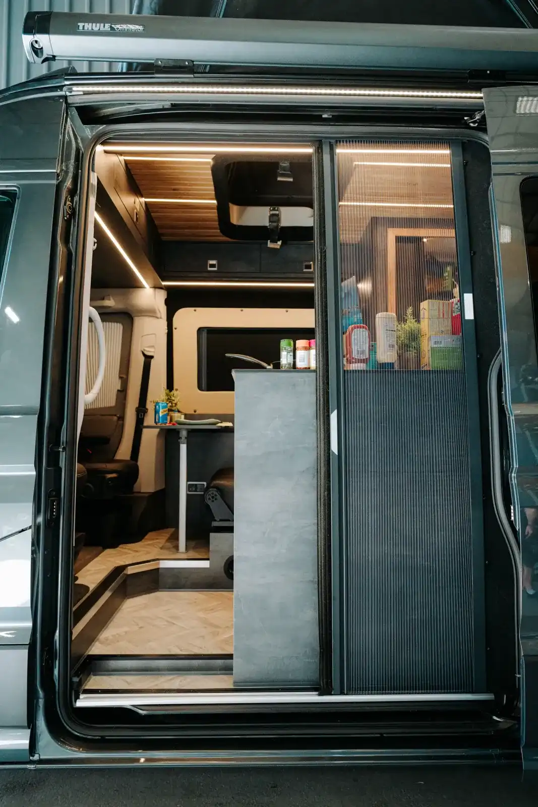 MAN TGE Ventus Pop-top campervan conversion by Custom Built Campervans Sheffield - professional van conversion showing interior and exterior craftsmanship