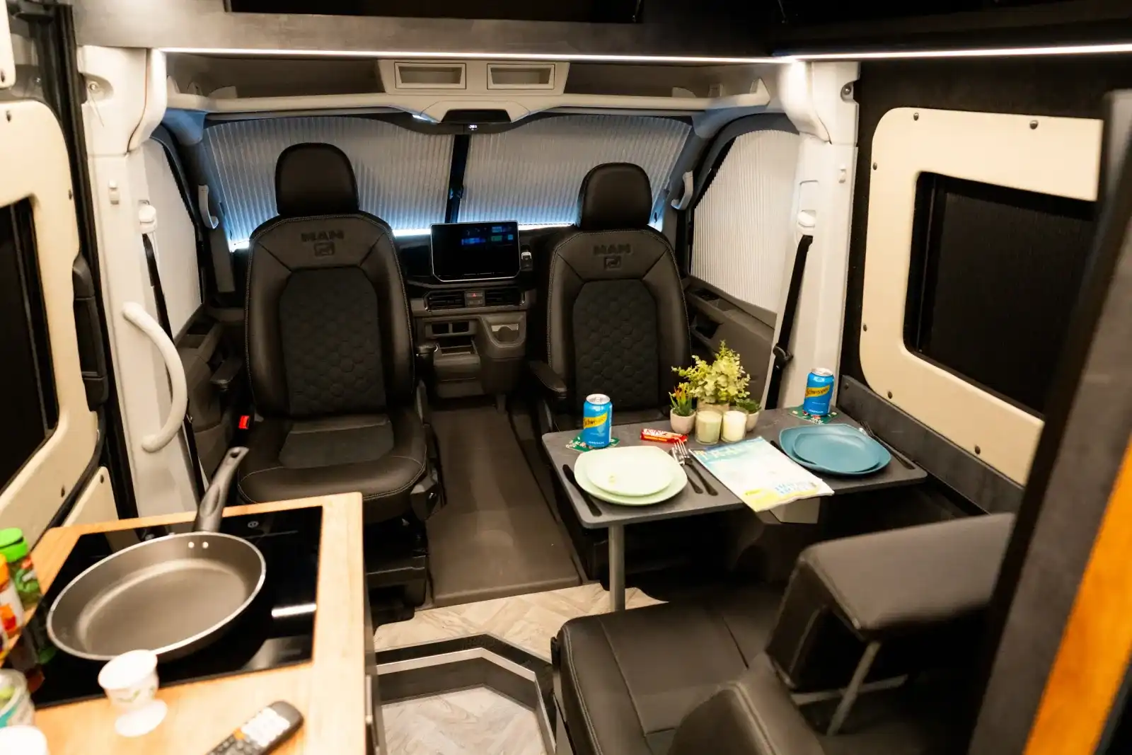 MAN TGE Ventus Pop-top campervan conversion by Custom Built Campervans Sheffield - professional van conversion showing interior and exterior craftsmanship