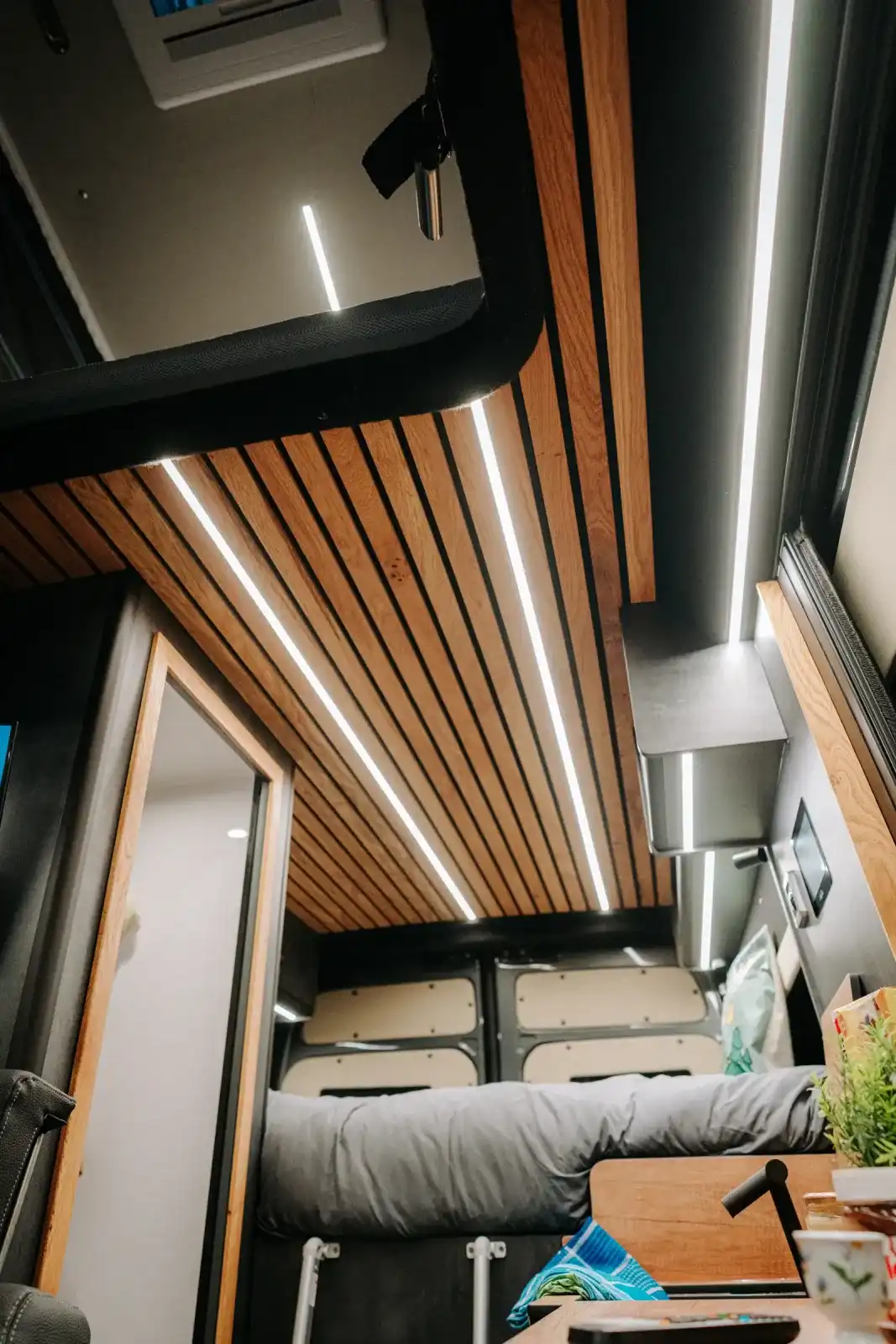 MAN TGE Ventus Pop-top campervan conversion by Custom Built Campervans Sheffield - professional van conversion showing interior and exterior craftsmanship
