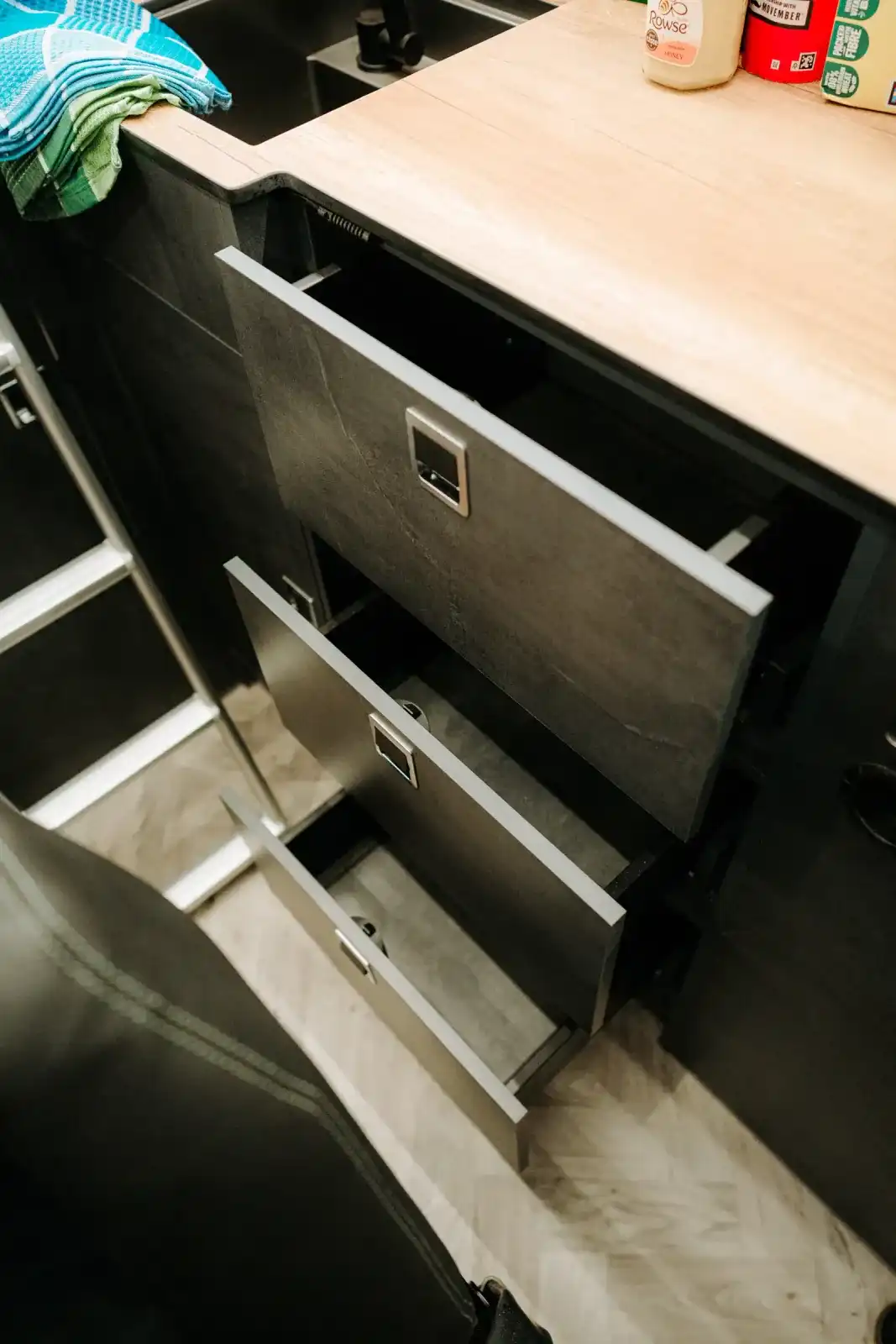 MAN TGE Ventus Pop-top campervan conversion by Custom Built Campervans Sheffield - professional van conversion showing interior and exterior craftsmanship