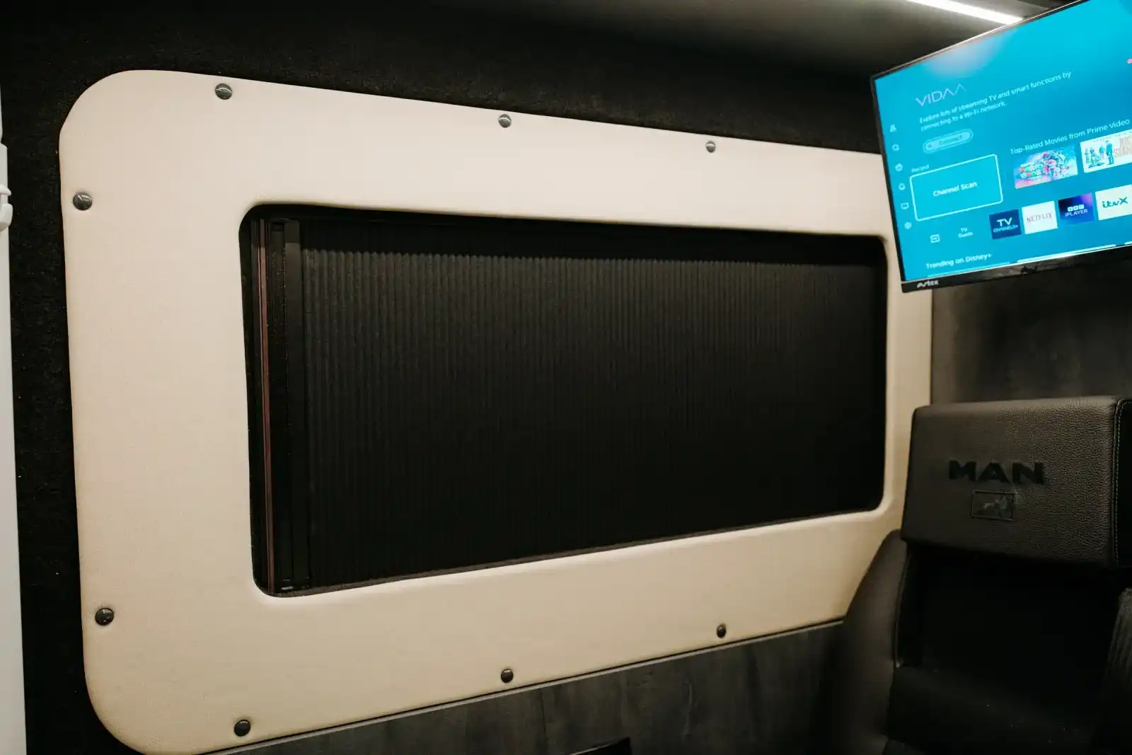MAN TGE Ventus Pop-top campervan conversion by Custom Built Campervans Sheffield - professional van conversion showing interior and exterior craftsmanship
