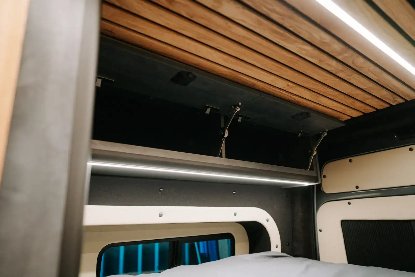 MAN TGE Ventus Pop-top campervan conversion by Custom Built Campervans Sheffield - professional van conversion showing interior and exterior craftsmanship