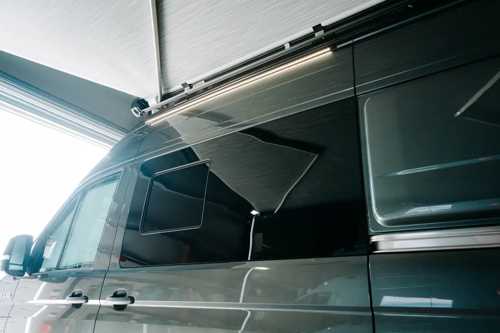 MAN TGE Ventus Pop-top campervan conversion by Custom Built Campervans Sheffield - professional van conversion showing interior and exterior craftsmanship