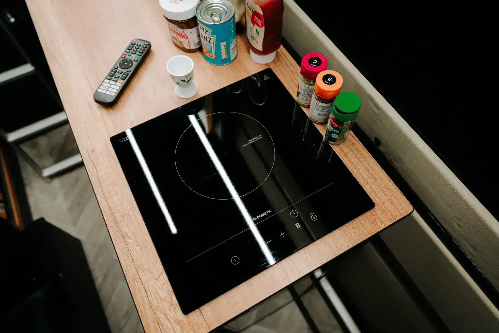 Induction hob in the worktop of a Ventus Pop-top MAN TGE campervan